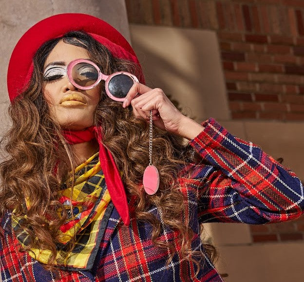 Vintage pink round sunglasses on model