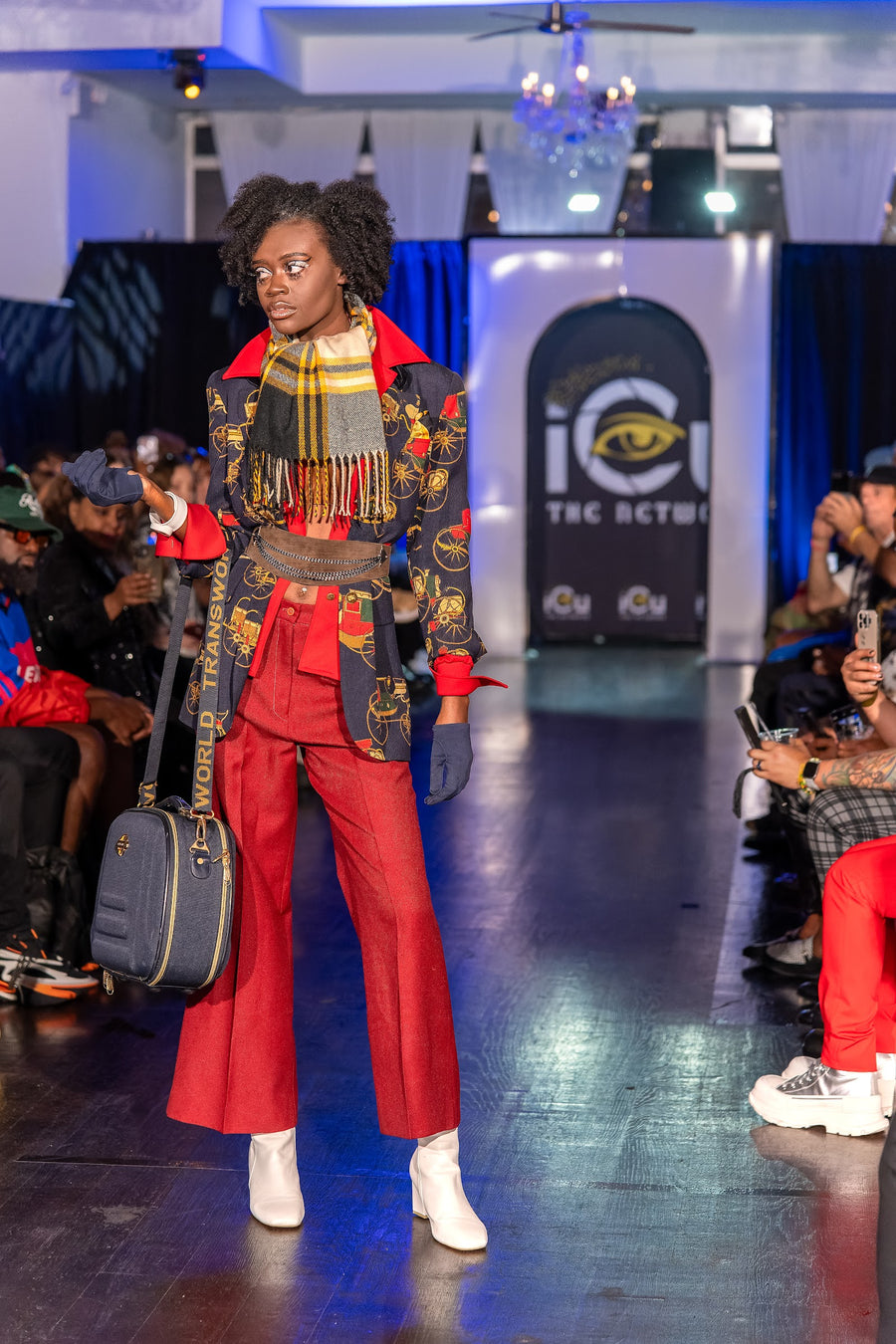 Runway look with vintage-style travel case